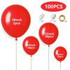 A collection of red latex balloons in various sizes including 18 inch, 12 inch, 10 inch, and 5 inch, along with accessories.