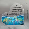 Clear acrylic heart-shaped decor featuring a blue sea turtle swimming underwater.