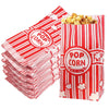 Red and white striped popcorn bags filled with popcorn for parties and events