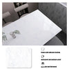 A white marble pattern self-adhesive backsplash panel shown in a kitchen context.