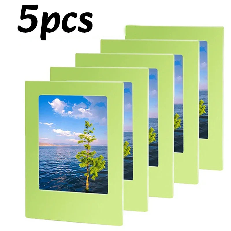 Five light green magnetic photo frames displayed in a row.