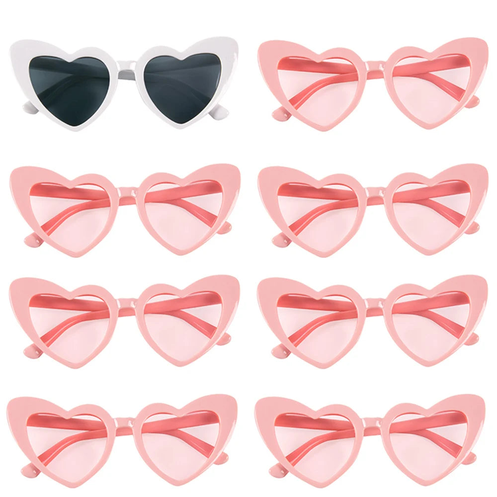 A set of pink and white heart-shaped sunglasses for special events