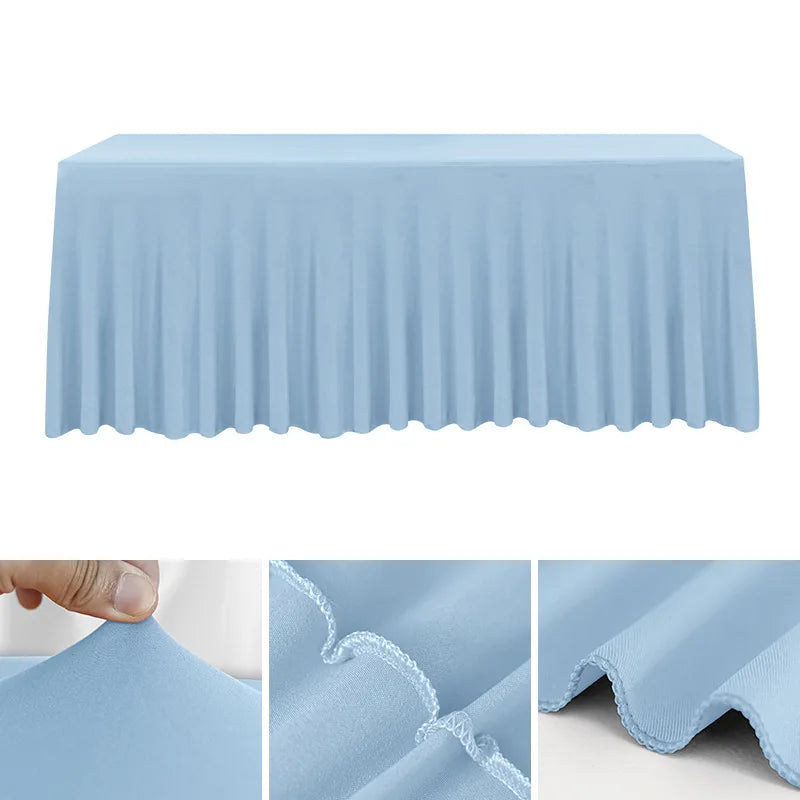 Light blue stretch rectangle tablecloth showing pleats and fabric texture.
