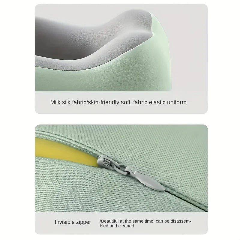 A close-up of a light green U-shaped memory foam neck pillow fabric and an invisible zipper detail.