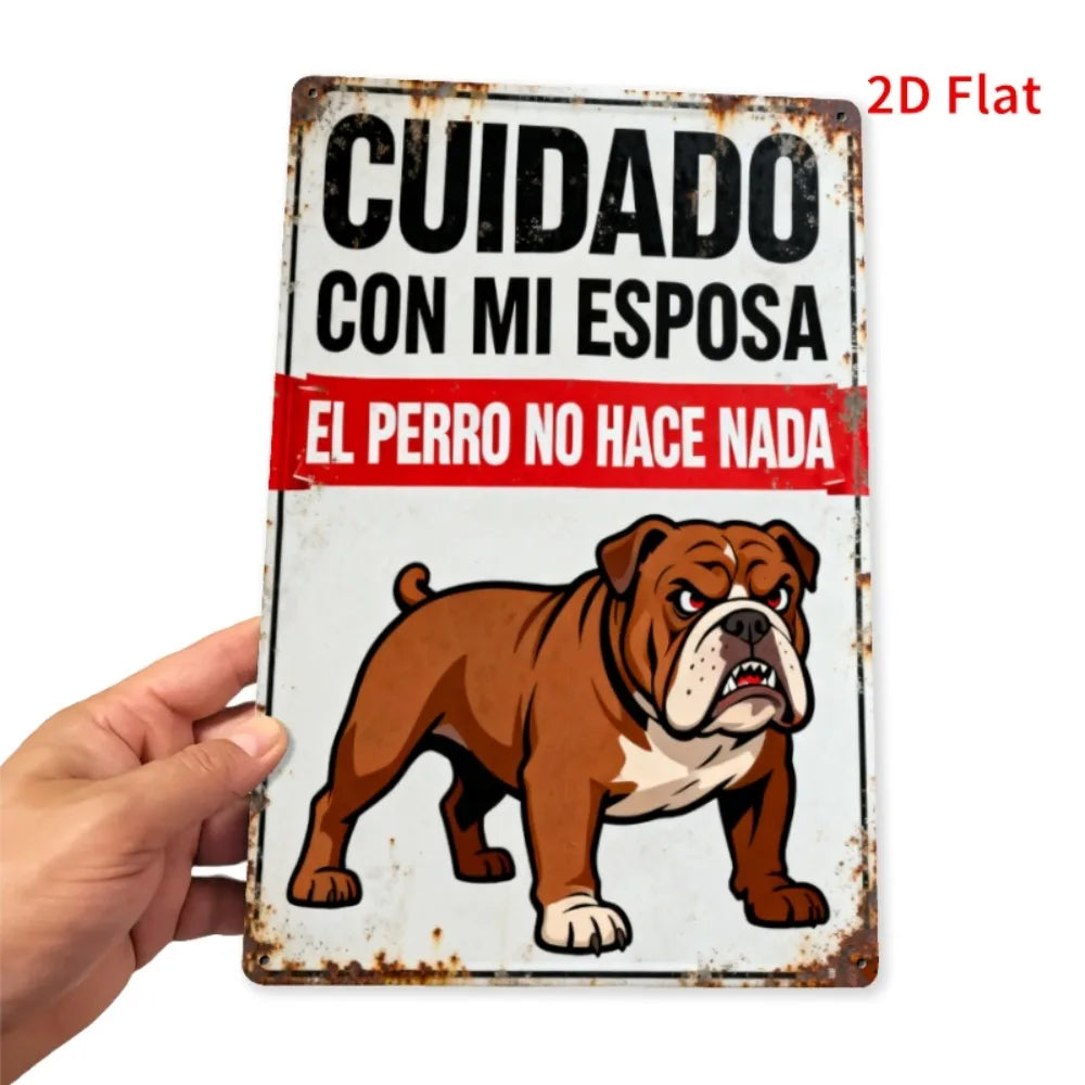 A vintage metal sign featuring text in Spanish and an illustration of a dog, held by a hand.