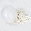 A bunch of white latex balloons in neutral shades for baby shower and birthday décor.