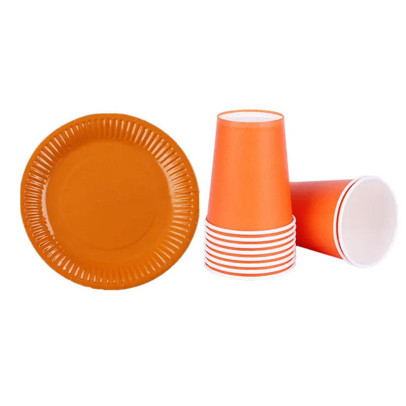 An orange disposable tableware set consisting of a plate and a cup.
