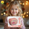 A young girl holds a pink DIY money box with a fingerprint sensor and keypad.