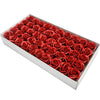 A rectangular box filled with numerous red artificial rose heads for wedding and party decoration.