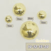 A collection of gold disco balls of various sizes, including 10, 12, 15, and 20 cm, displayed against a white background.
