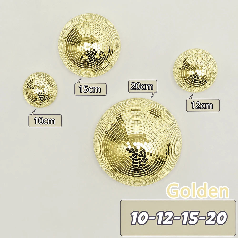 A collection of gold disco balls of various sizes, including 10, 12, 15, and 20 cm, displayed against a white background.