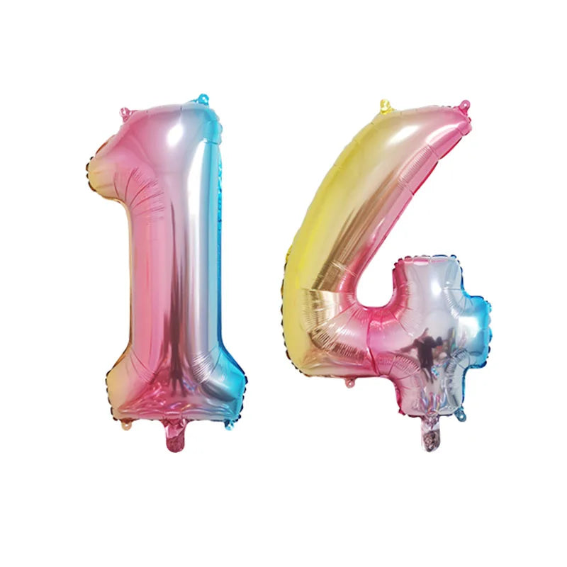 Two foil balloons shaped like the numbers 1 and 4 in pink and gold colors for birthday party decor