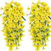 A pair of artificial yellow morning glory hanging vines used for decoration.