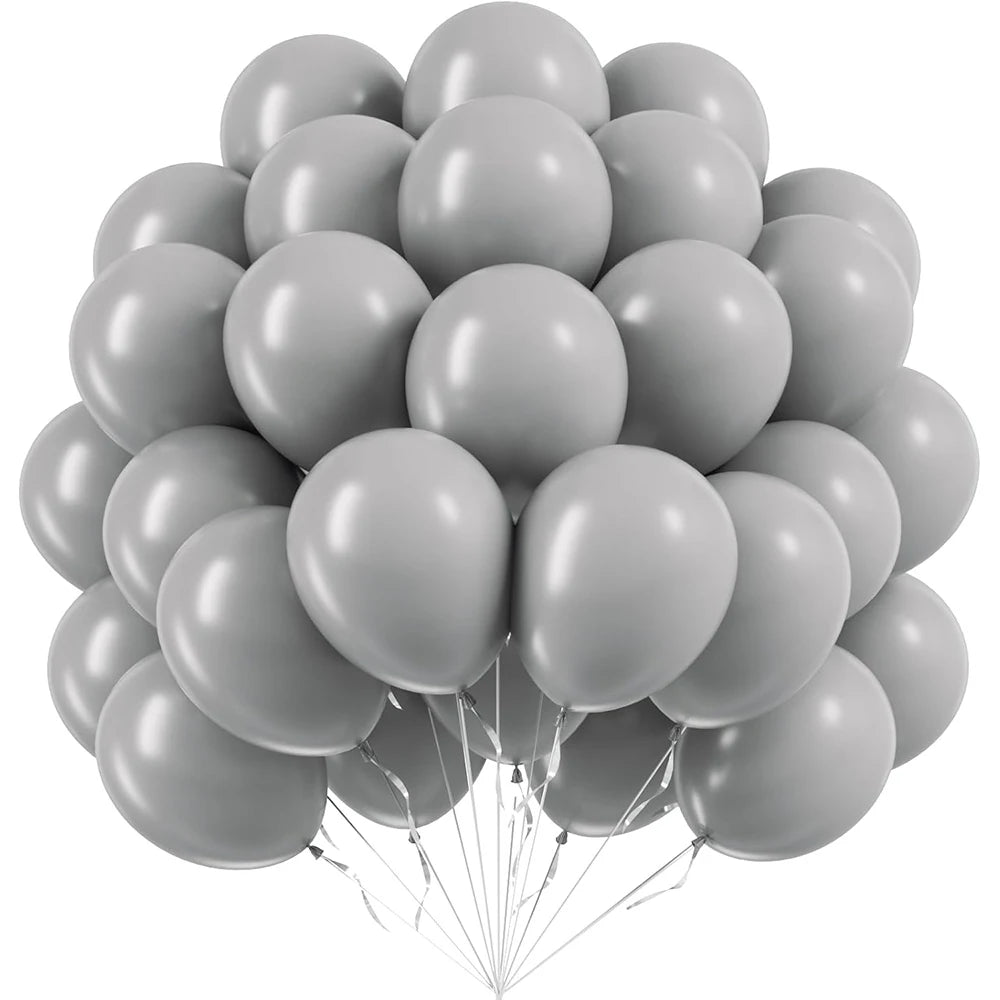 A bunch of assorted gray latex party balloons tied together, ready for celebrations.
