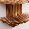Two wooden wall shelves with striped grain patterns mounted on a white wall.