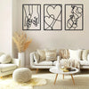 A set of three black line art prints featuring motifs of holding hands, love, and kissing faces displayed on a white wall.