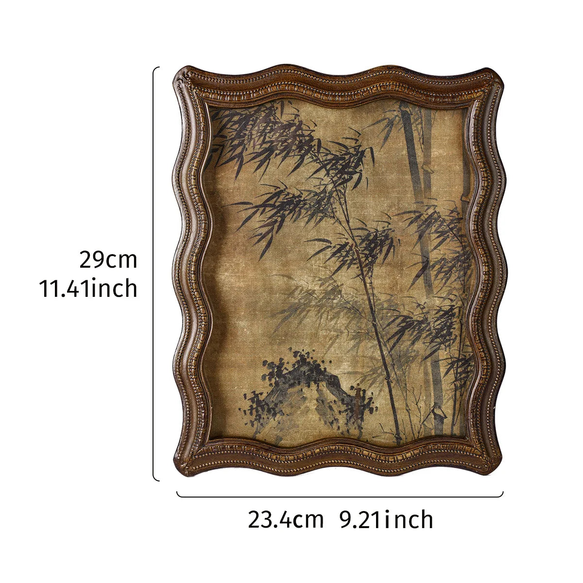 A vintage resin photo frame decor with a distressed gold-brown frame and a dark botanical print.