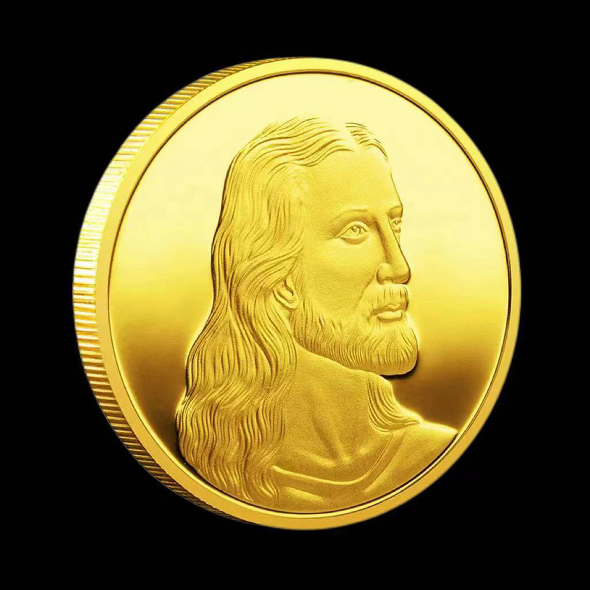 A gold commemorative metal coin featuring a profile portrait of Jesus Christ.