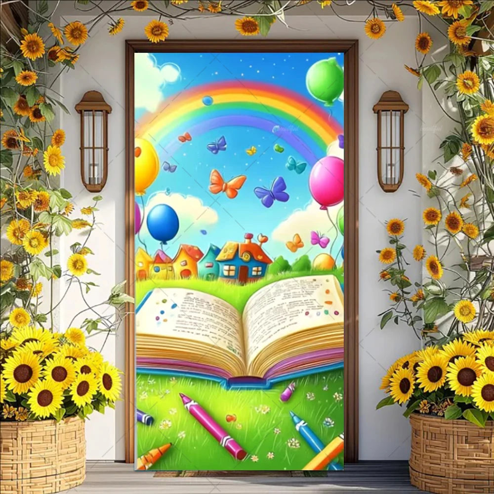 A vibrant vinyl backdrop banner featuring a rainbow, balloons, and an open book surrounded by sunflowers.
