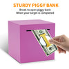 A pink box piggy bank with a slot open, showing US currency inside.