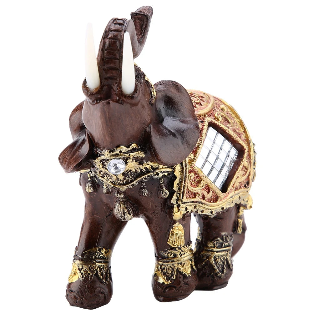 Dunkelbraunes traditionelles chinesisches Feng-Shui Elefanten-Statue für Wohlstand und Glück mit Elfenbeinzähnen und Goldakze