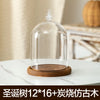 Glass aromatherapy candle holder with a clear dome and a wooden base