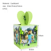 A cardboard decoration kit featuring a green box with a heart-shaped topper and colorful cartoon characters.