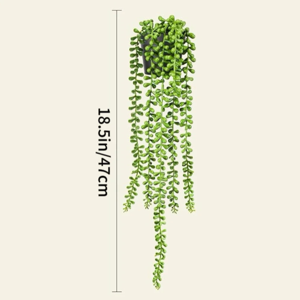 A vertical display of realistic hanging artificial ivy vines used for indoor and outdoor decor.