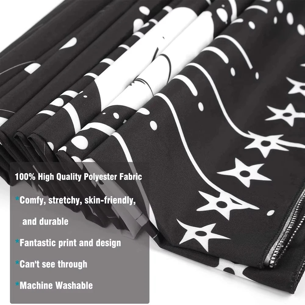 Black and white patterned polyester fabric roll showing a flowing design print