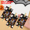 A hand holds several Halloween glow stick cards with festive designs and wooden sticks.