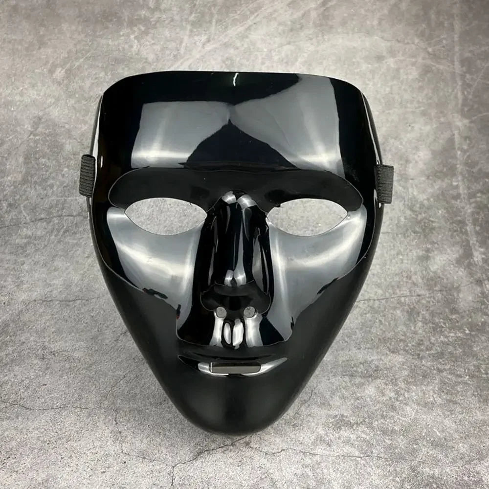 A glossy black masquerade mask with a stylized face and ear loops.