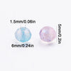 A round, flat purple AB crystal glass bead measuring 6mm, shown next to a scale.