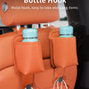 An orange multifunctional water bottle hook attached to a car seat organizer, holding two blue bottles and shopping bags.