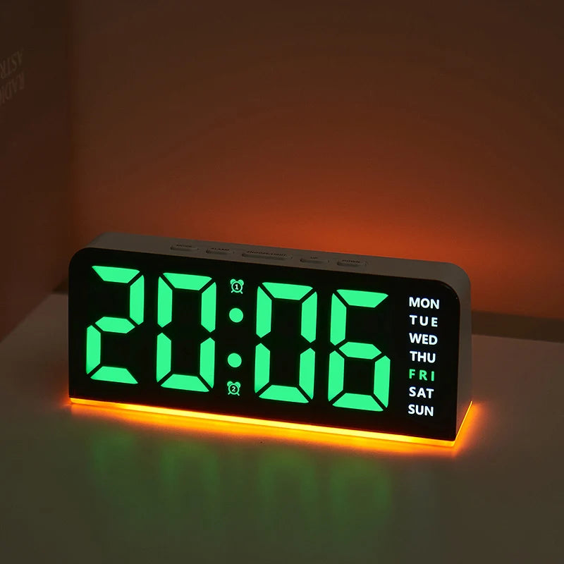 A digital alarm clock displaying 20:06 with a bright green LED display and an orange ambient light.
