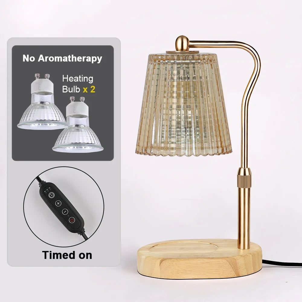 A brass adjustable electric candle warmer lamp with a textured glass shade and wooden base.