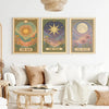 Frameless celestial wall art set featuring canvas prints of the sun, star, and moon in gold and earth tones