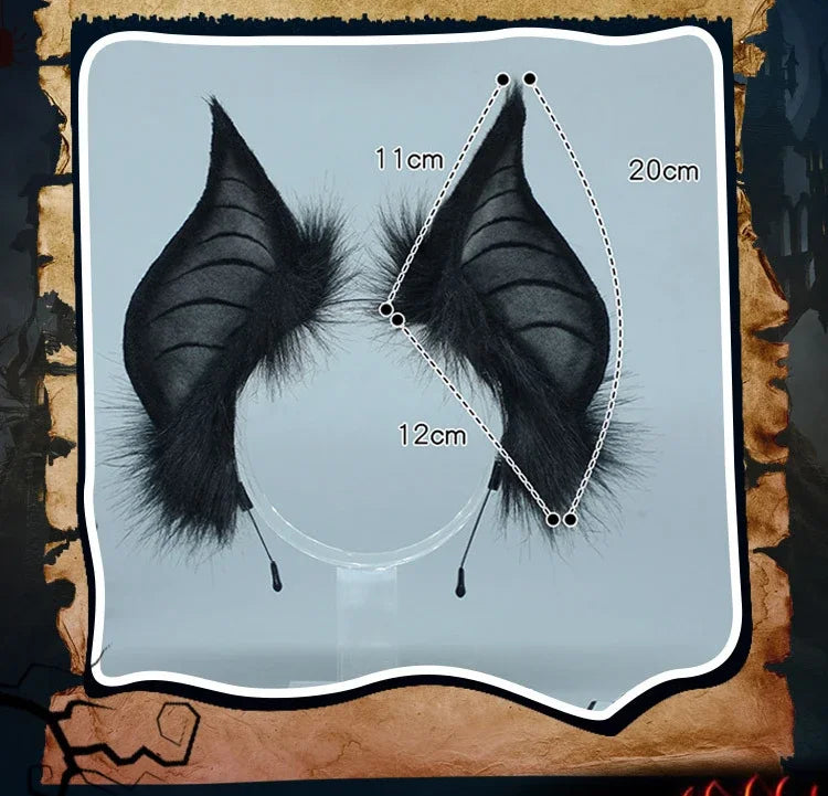 A pair of black bat simulation wings with measurements marked on a light gray background.