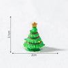 A small, green, conical Christmas tree charm with a gold star topper, shown against a white background.
