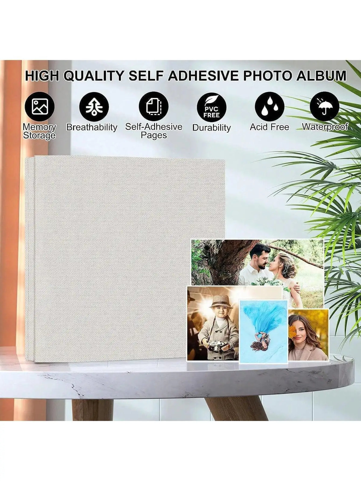 A beige linen photo album with self-adhesive pages is displayed next to a potted plant.