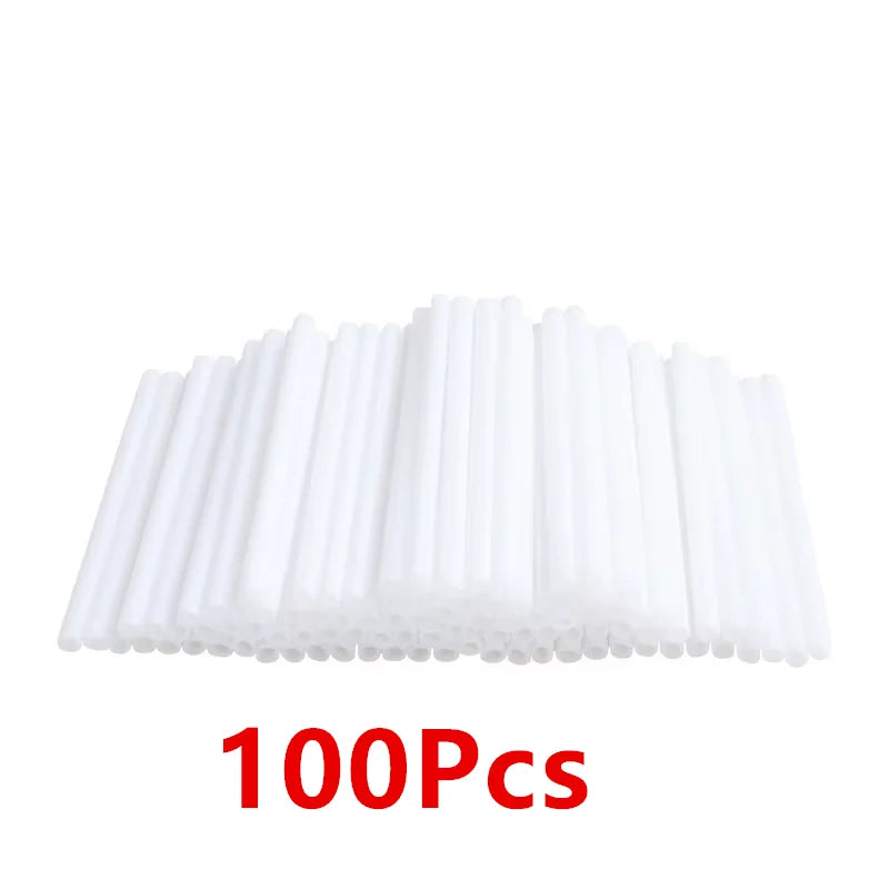 A pack of 100 white lollipop sticks for candy making arranged in a row.