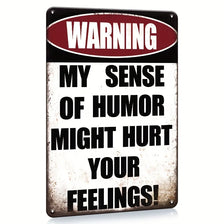 A vintage metal tin sign with a warning label that reads My Sense of Humor Might Hurt Your Feelings