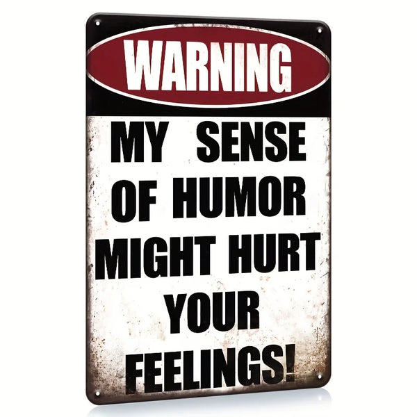 A vintage metal tin sign with a warning label that reads My Sense of Humor Might Hurt Your Feelings