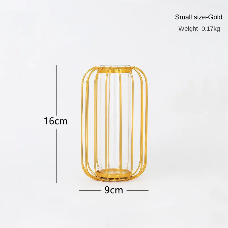 Small size gold iron hollow vase with vertical lines, measuring 16cm high and 9cm wide.