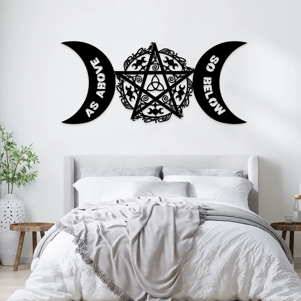 Black metal wall art featuring a pentagram design with crescent moon shapes and text.