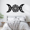 Black metal wall art featuring a pentagram design with crescent moon shapes and text.