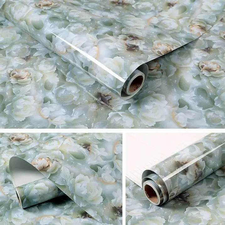 Roll of marble contact paper featuring a light green and white floral pattern