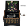 A wooden music box featuring an illustration of the Detective Conan characters on the lid.