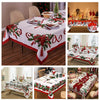 Christmas poinsettia rectangle tablecloths displayed on dining tables with festive red and green decor.
