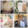 A backdrop cover for a party photo booth decorated with green and white balloons and a soccer football field theme.