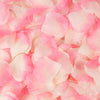 Pink artificial silk rose petals scattered on a white background.